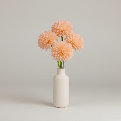 White vase with peach-colored flowers on a light gray background