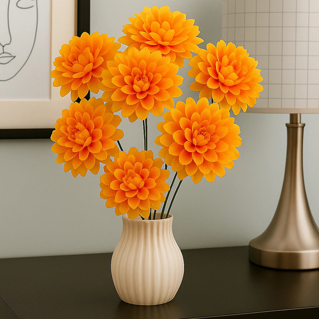 Orange flowers in a white vase on a dark surface with a lamp and framed picture in the background.