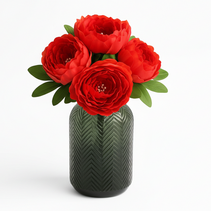 Green vase with red flowers on a white background