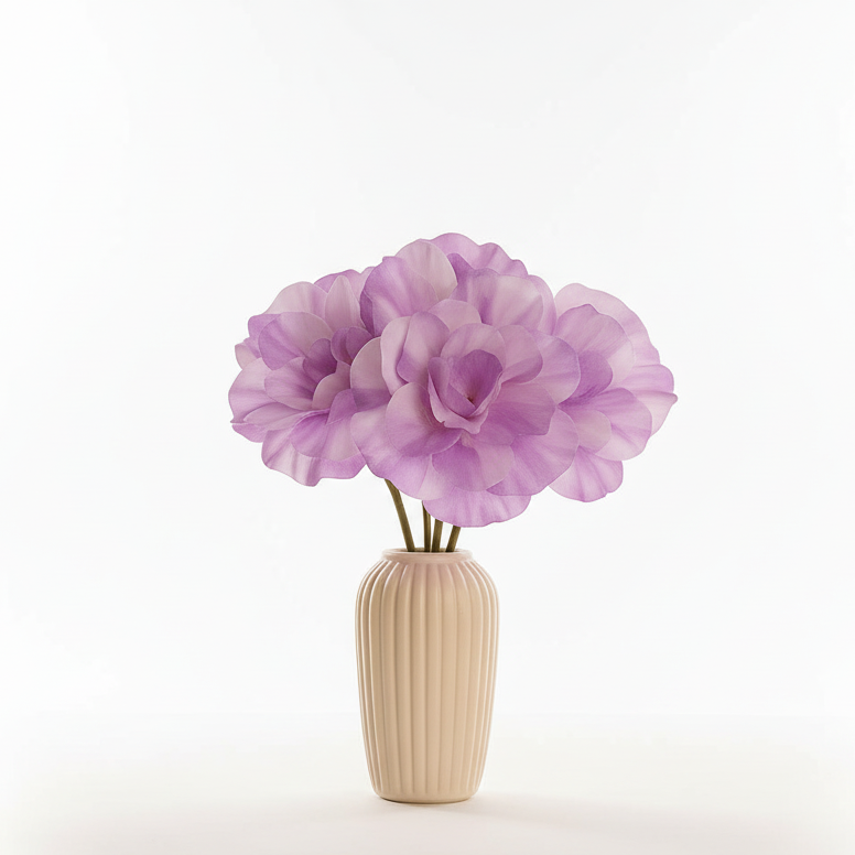 Vase with a single purple flower on a white background
