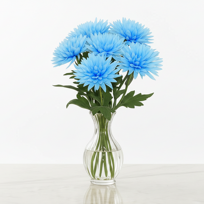 Clear glass vase with blue flowers on a white background